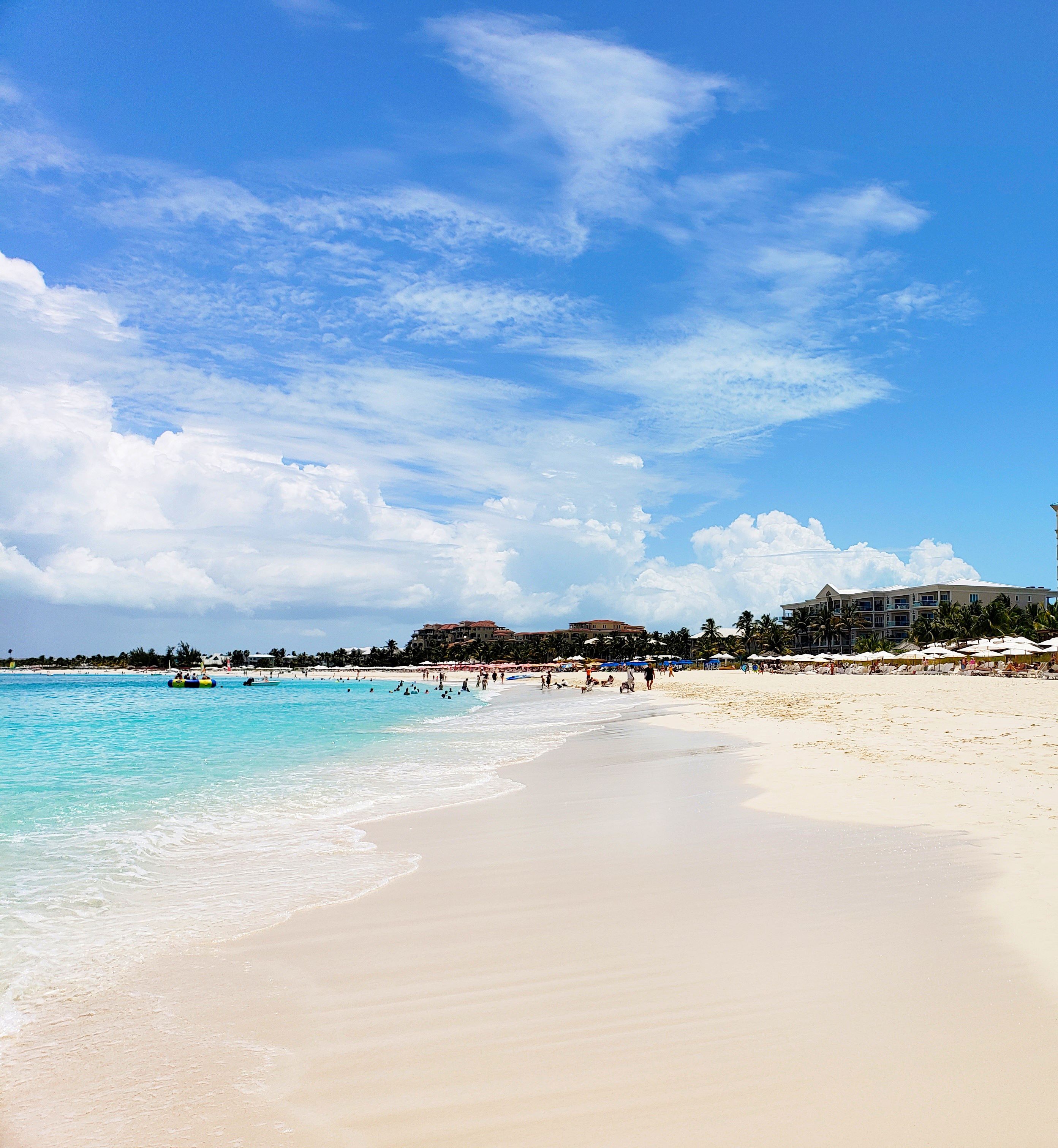 Long, soft, white sand beach and calm clear blue waters at Grace Bay beach, Turks and Caicos.