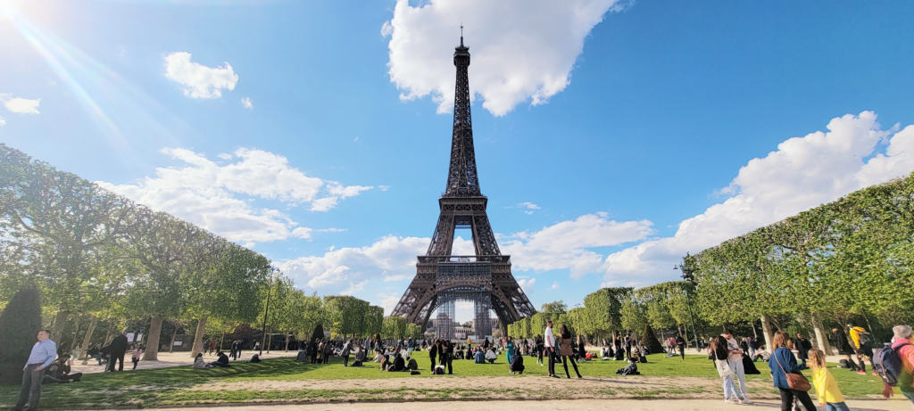 Eiffel Tower in Paris from Champs de Mars in the daytime.