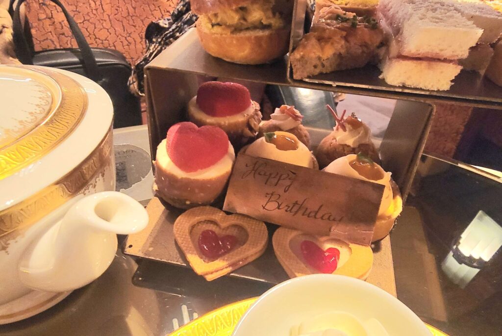 Close up of "Happy Birthday" on chocolate with our afternoon tea at Toronto's Clockwork.