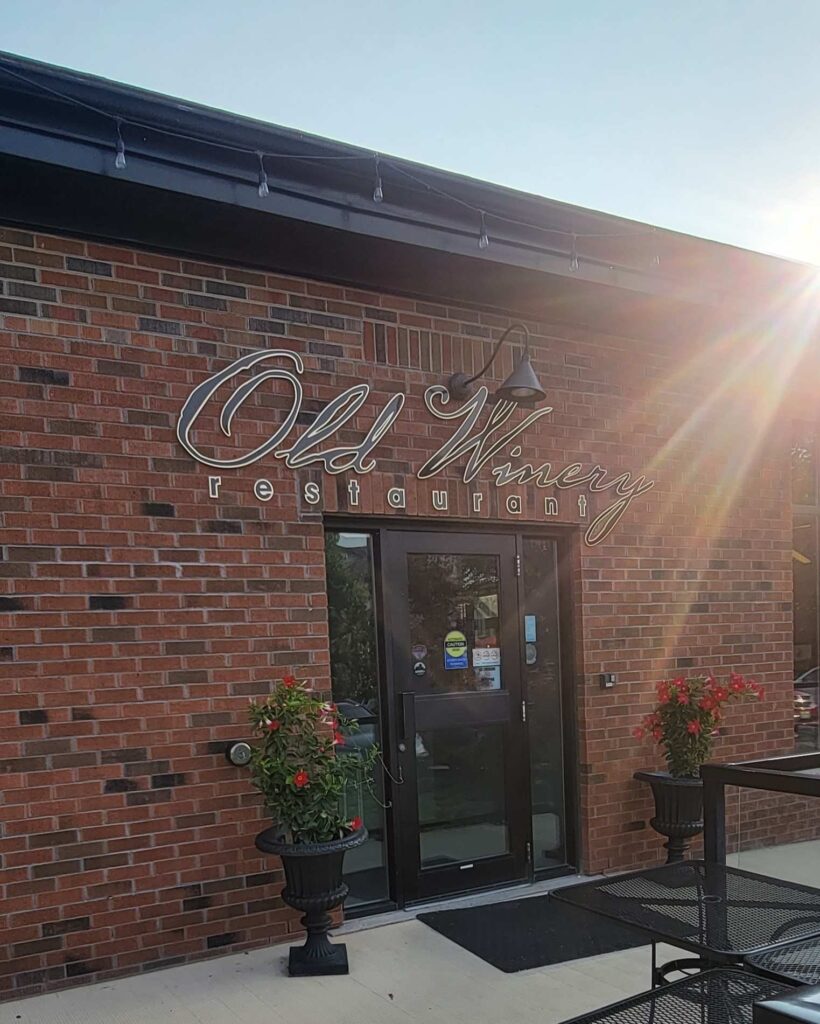 Entrance Door with signage of Old Winery Restaurant in Niagara, Ontario.