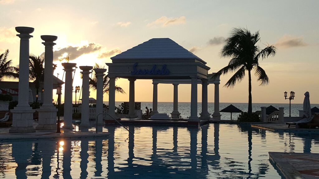 A sunset and pool view at Sandals Royal Bahamian Resort in Bahamas.