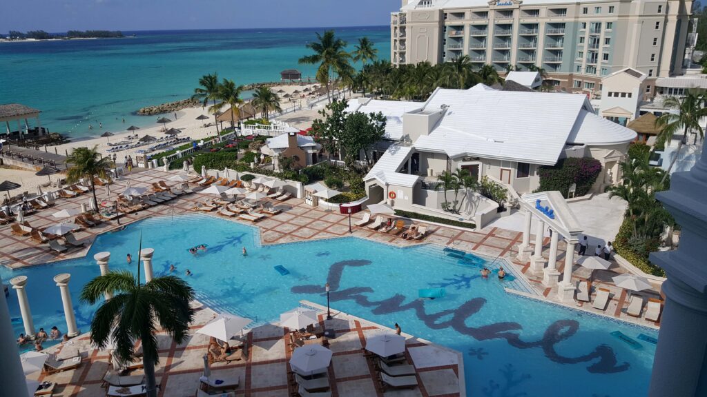 Elevated view of Sandals Royal Bahamian pool, resort and beach.