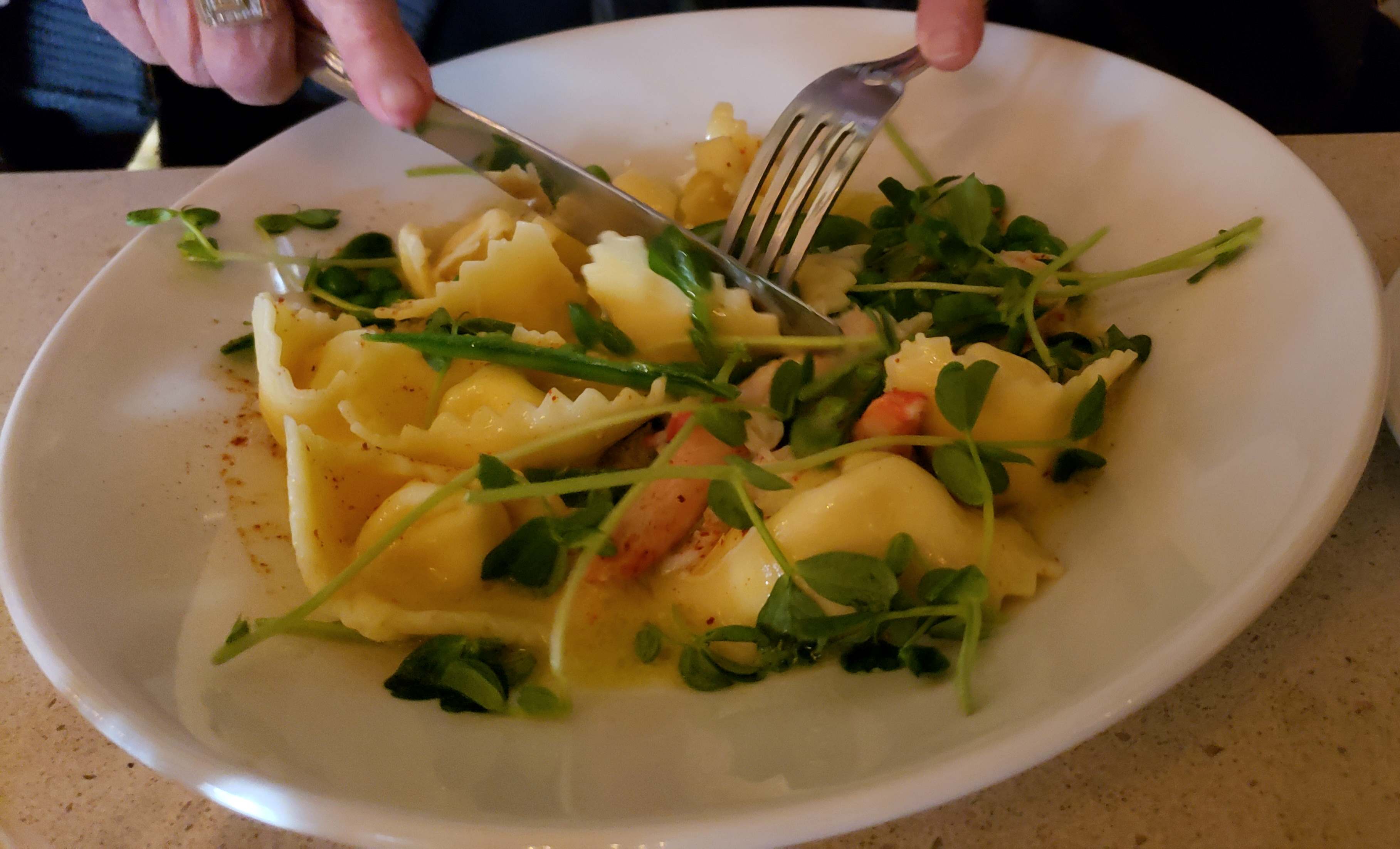 Close up of pasta on white circular plate at Kitchen 76 restaurant in Niagara-on-the-lake.