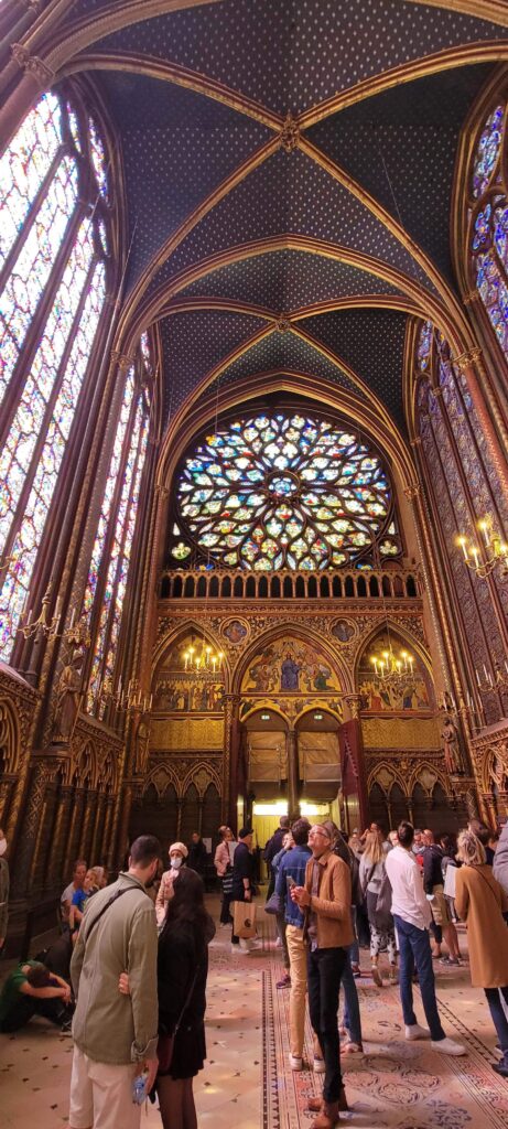 Colorful stain glass windows inside Sainte Chapelle in Paris, France.