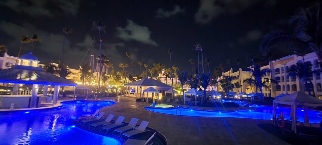 The pools at Iberostar Grand Bavaro at night with lights