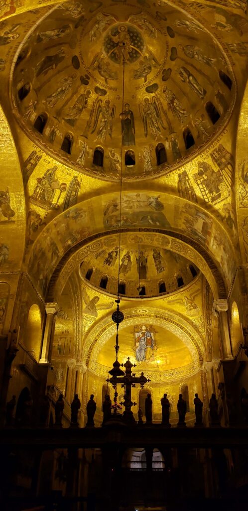 Stunning gold mosaic inside seen during Saint Mark's Basilica tour.