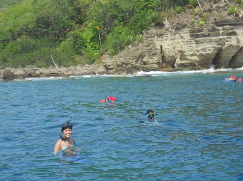 Snorkelling by The Pillars of Hercules in Antigua during a stop on the Xtreme Circumnavigation tour.