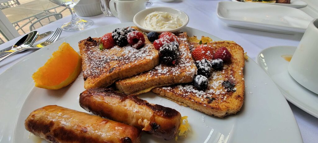 Close-up of French Toast served with sausage during our stay at The Charles Hotel.