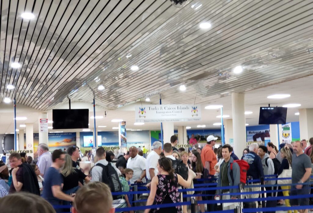 Long lines forming at Providenciales Airport in Turks and Caicos which we by passed with fast track airport arrival.