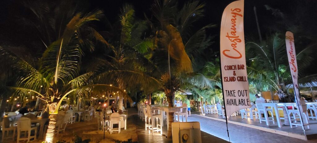 Exterior of Castaways Conch Bar & Island Grill in the evening, great for casual dining in Turks and Caicos.