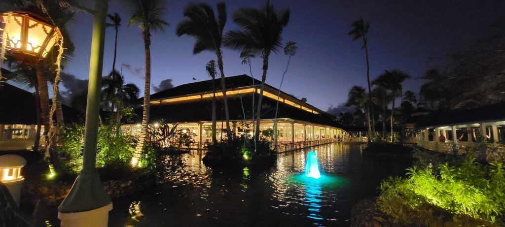 Exterior of the buffet Restaurant at night at Iberostar Selection Bavaro Suites.