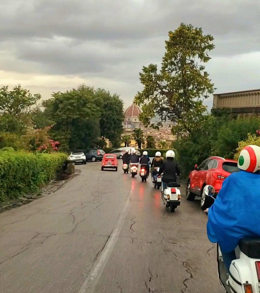 Our group from Florence Vespa Tour with the city of Florence in the background