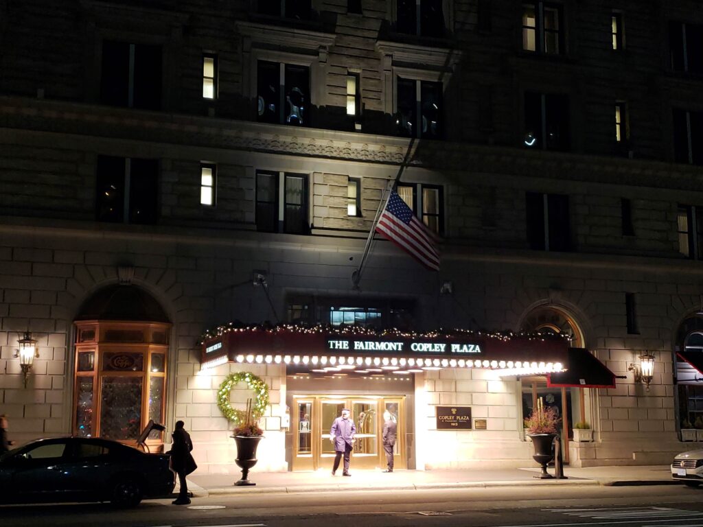 Fairmont Copley Plaza entrance at night.