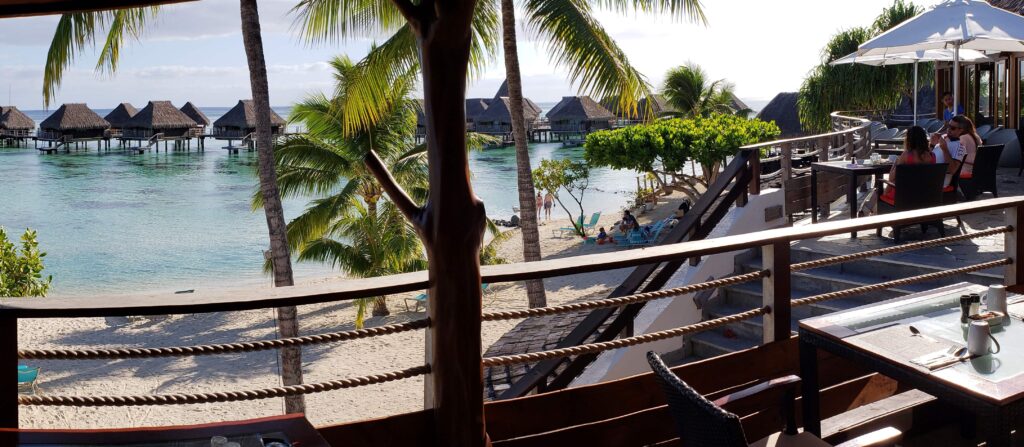 Elevated view of the beach and some bungalows at the Hilton Moorea Lagoon Resort & Spa.