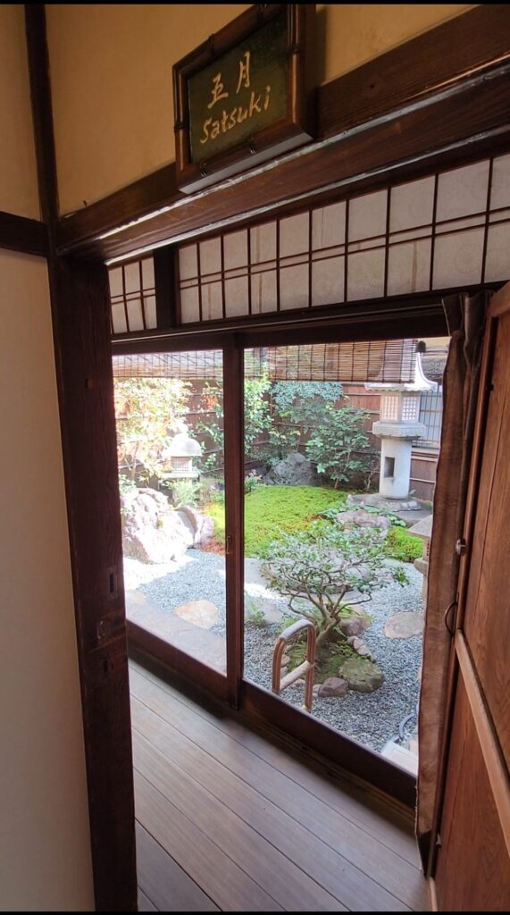 Door and entrance of Satsuki room at Toshiharu Ryokan.