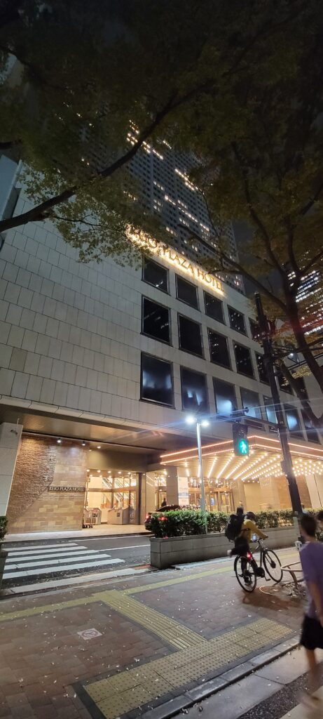 Exterior of Keio Plaza Hotel Tokyo at night.