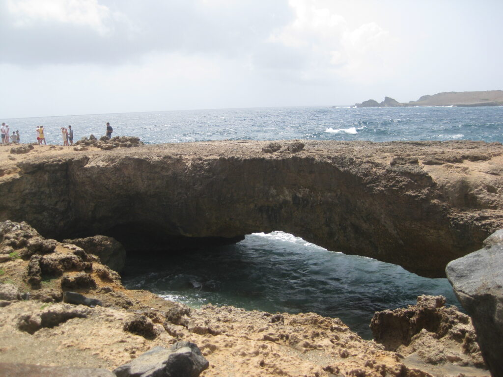 Natural bridge during a stop from our Aruba jeep tour.