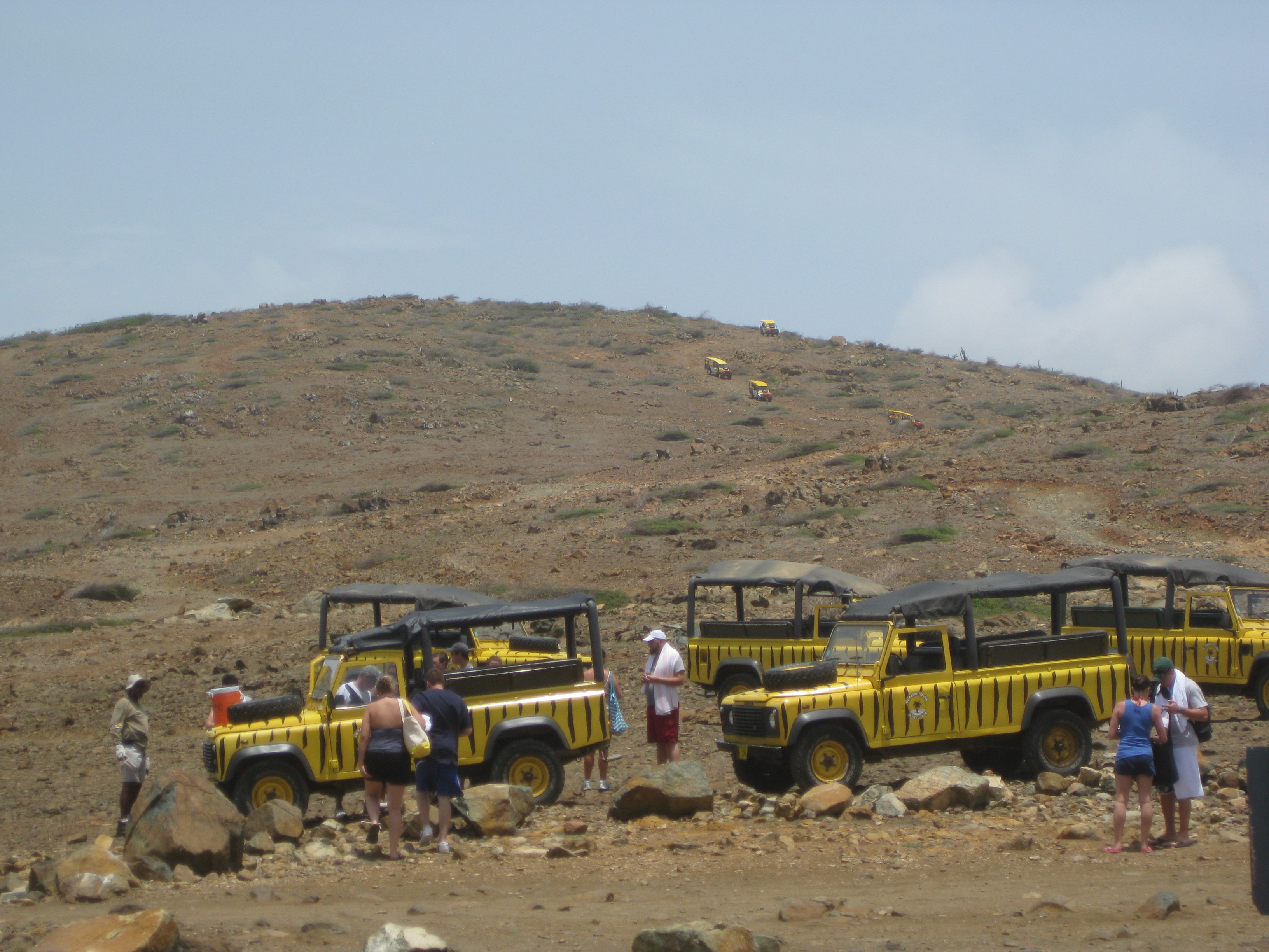 Parked jeeps on the hillside from our Aruba Jeep Tour.