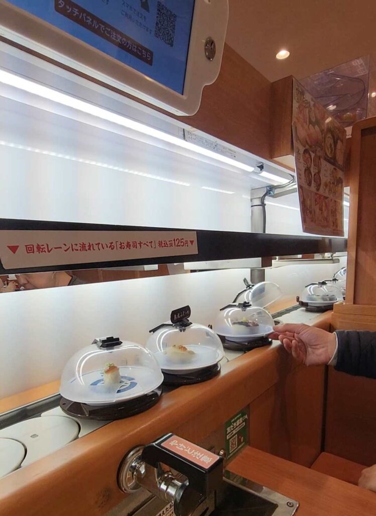 Conveyor belt sushi at Kura Sushi in Tokyo.