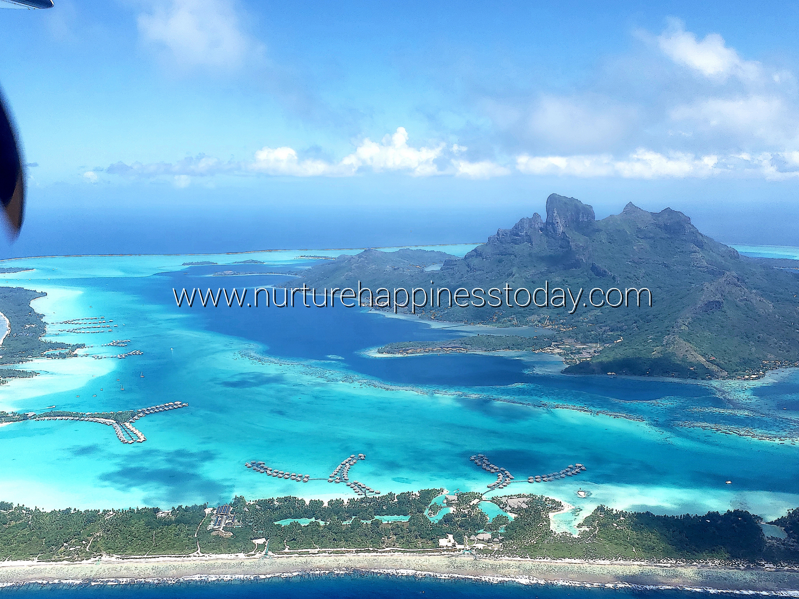 Stunning view of Bora Bora from the plane on a sunny day.