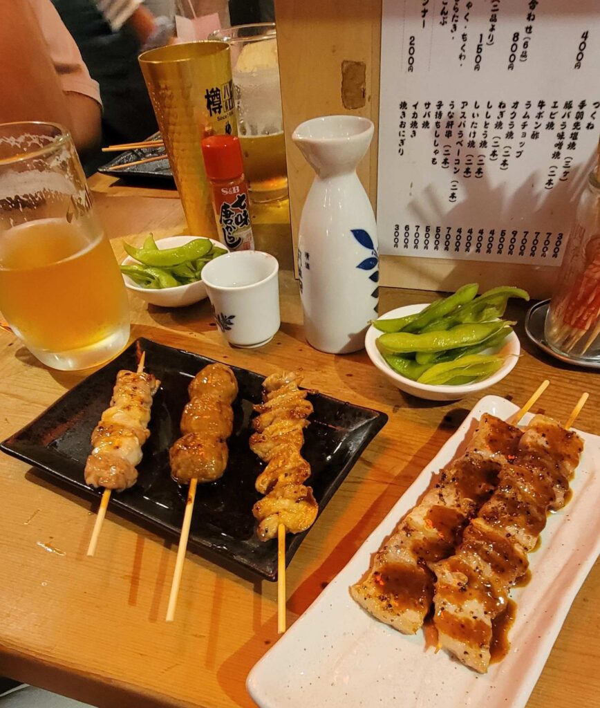 Food in Tokyo we ate at Omoide Yokocho, or "Memory Lane": yakitori skewers, beer, sake, edamame. 